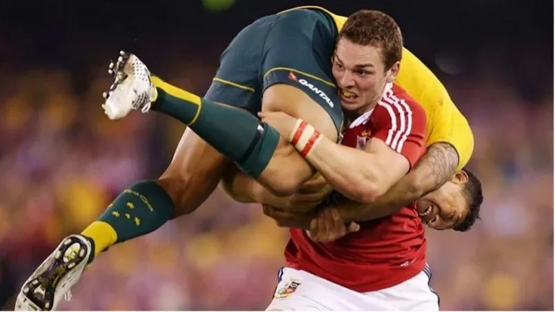 4. Israel Folau is Picked Up by George North.jpg?format=webp
